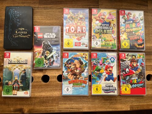 Nintendo Switch OLED mit 16 Spielen