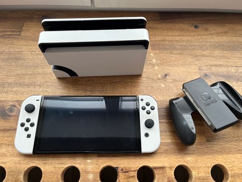 Nintendo Switch OLED mit 16 Spielen