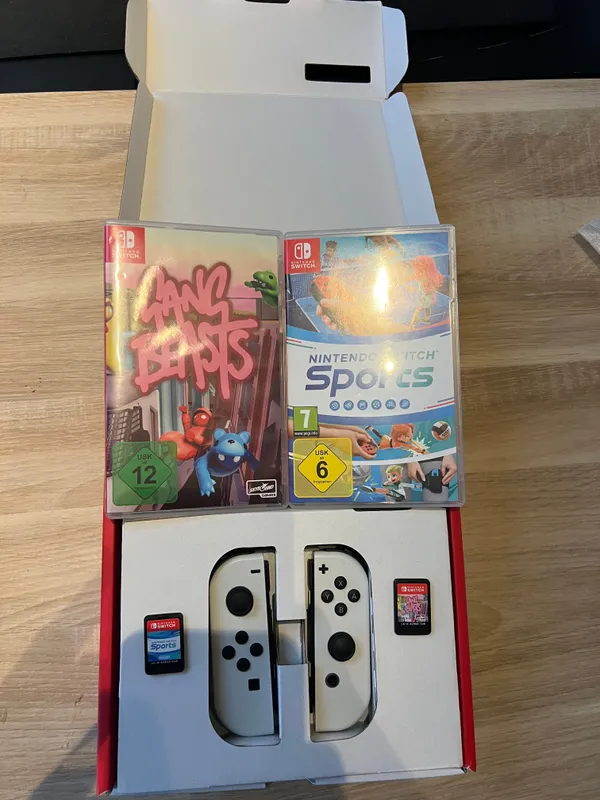 Nintendo Switch OLED mit 4 Controllern 