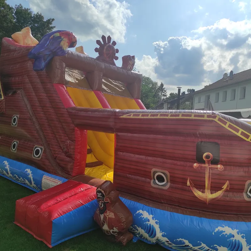 Profi Hüpfburg Piratenschiff mit Rutsche