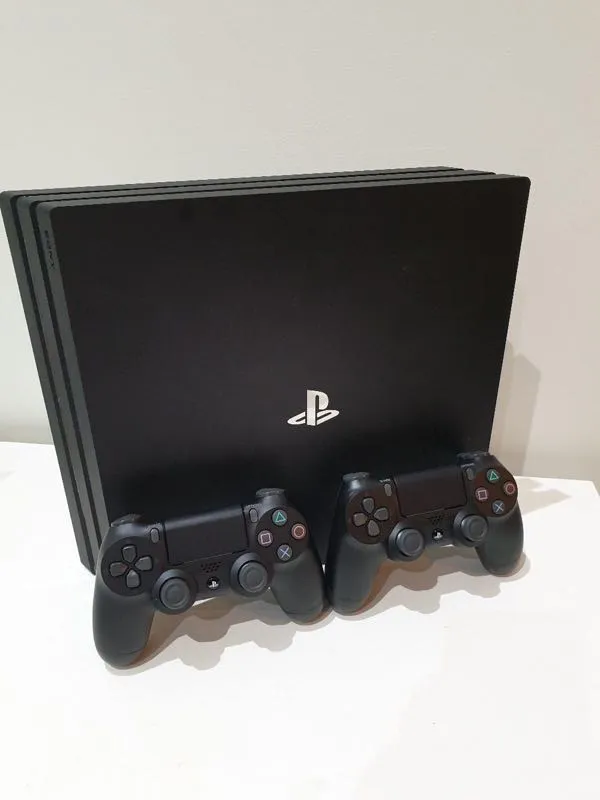 PS4 Pro + two controllers