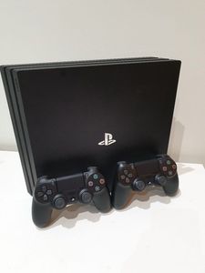 ps4-pro-two-controllers preview image